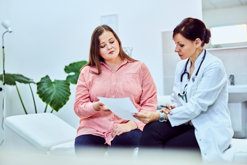 Women discussing weight loss injection with a doctor in Sandusky, OH